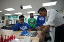 Prime Minister Rishi Sunak is shown a 3D printed chess set during a visit to the Friendship Technology Preparatory High School during his visit to Washington DC in the US (Kevin Lamarque/PA)