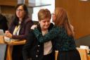 Nicola Sturgeon is set to receive flowers from SNP MSPs following her arrest