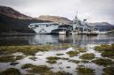 The Royal Navy aircraft carrier HMS Queen Elizabeth at Glen Mallan, in Loch Long, as the vessel visits western Scotland for the first time.
