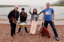 From left: Duncan Chisholm of Wolstone, Iain Bayne of Runrig, singer Julie Fowlis and organiser Garry Innes of Manran on the shores of Loch Ness