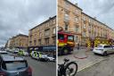 The street was taped off while four crews fought to extinguish the blaze