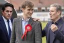 Newly elected Labour MP Keir Mather, centre, with his party leader Keir Starmer, right, after the by-election win