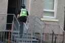 Eight police staff treated at the scene after major 'chemical' incident on Altyre Street