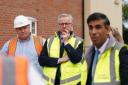 Michael Gove pictured in Norwich on Tuesday alongside Prime Minister Rishi Sunak