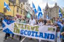 First Minister of Scotland Humza Yousaf taking part in a Scottish independence march in Edinburgh