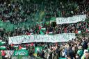 The Green Brigade hold up a banner for Palestine during a cinch Premiership match between Celtic and Kilmarnock