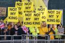 Not My King signs are abundant outside the Palace of Westminster