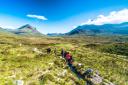 How does the right to roam in Scotland differ from the law in England?
