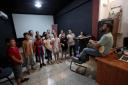 Palestinian young people take part in a class at Freedom Theatre despite Israeli raids in Jenin, West Bank