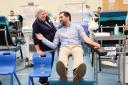 Humza Yousaf joked about trying to dodge the ironing as he encouraged people to donate blood