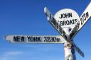 A photo showing the famous John O' Groats sign on the NC500