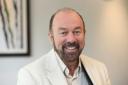 Controversial business tycoon Brian Souter was asked to help arrange a dinner with business leaders