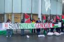 Protesters hosted a die-in outside the Baillie Gifford offices in Edinburgh