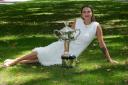 Aryna Sabalenka of Belarus poses with the Daphne Akhurst Memorial Cup (Andy Wong/AP)
