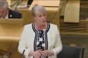 Deputy First Minister Shona Robison attacked the Tories for a 'new age of austerity' as MSPs voted on the Scottish Budget
