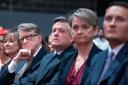 Peter Mandelson (left) sits with Labour frontbenchers watching shadow chancellor Rachel Reeves at the party's conference