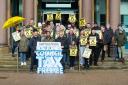 First Minister Humza Yousaf celebrated delivering a national council tax freeze outside Inverclyde Council headquarters in Greenock.