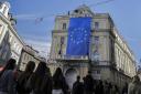 A view of European Union (EU) flags being hung on the streets as negotiations between EU and Bosnia and Herzegovina on the country's EU membership start