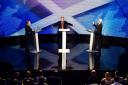 Alex Salmond (L) First Minister of Scotland and Alistair Darling (R) chairman of Better Together on a live television debate hosted by Bernard Ponsonby