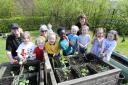 Aileymill Nursery children have fun in the garden with early learning officer Caroline Gillan, Alice Paul and Julie Anson