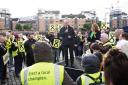 Scottish First Minister and SNP leader John Swinney gives a speech