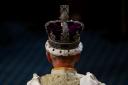 King Charles III wears the Imperial State Crown on the day of the State Opening of Parliament at the Palace of Westminster