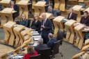 First Minister of Scotland John Swinney during First Minister's Questions at the Scottish Parliament in Holyrood, Edinburgh. Picture date: Thursday May 16, 2024..