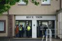 Police presence outside the Cairn Hotel in Bathgate, which is used to house asylum seekers.