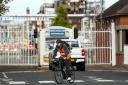 Workers are seen outside the Petroineos oil refinery on September 12, 2024 in Grangemouth, Scotland.