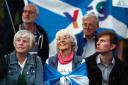 Supporters of Indyref2 attend a rally arranged by Believe in Scotland outside the Scottish Parliament