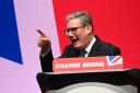 Prime Minister Keir Starmer gestures as he delivers his keynote speech during the Labour Party conference