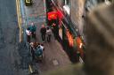 Partygoers outside Sneaky Pete's in Edinburgh's Cowgate