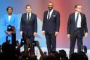 (left to right) Tory leadership candidates, Kemi Badenoch, Robert Jenrick ,James Cleverly and Tom Tugendhat, stand together on stage