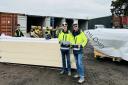 JML SIPs directors Derek McIntyre, left, and John Langley with staff at their Auchterarder base loading an order which is heading for the Falkland Islands