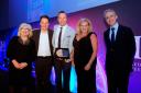 Pictured at the awards are, from left: Mandy Gill (executive director of global learning, CISI); Paul McCabe (chartered financial planner); David Gow (director); Pauline Hamilton, (compliance manager); and presenter Amyr Rocha Lima