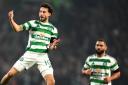 Nicolas Kuhn, left, celebrates scoring for Celtic in their Champions League match against RB Leipzig at Parkhead tonight with his team mate Cameron Carter-Vickers