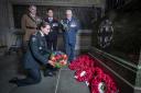 Canadian Army Captain Mackenzie Savill lays a wreath at the Scottish National War Memorial.