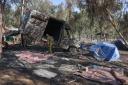 Israeli soldiers search the site of the weekend attack by Palestinian militants on the Supernova Desert Music Festival, near kibbutz Reim in the Negev desert in southern Israel on October 12, 2023. Thousands of people, both Israeli and Palestinian, have