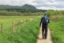 Robin walking along the John Muir Way