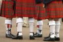 Kiltmakers say they are struggling with high demand as couples who have been waiting for two years to get hitched are queuing up at the door