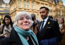 Clara Ponsati and her lawyer Aamer Anwar (right) depart from court in Scotland after an extradition hearing last month