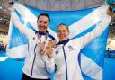 Scotland's Katie Archibald (left) celebrates with her silver medal and Neah Evans with her bronze medal at the 2018 Commonwealth Games