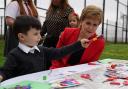 First Minister of Scotland Nicola Sturgeon during a visit to the Indigo school-aged childcare at Castleton Primary School