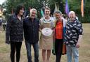 Peter Sawkins (centre) with the presenters and judges of the Great British Bake Off