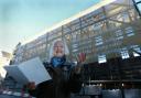 Edinburgh's Makar Christine De Luca reads poetry in front of the UK's largest poem which was unveiled in Edinburgh's Canongate. 'Spiral' has been reproduced on a 25x8 metre benner to mark National Poetry Day