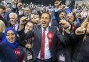 Anas Sarwar celebrates with Labour candidates at the vote count in Glasgow - where his party narrowly failed to win. Photo: PA