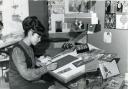 An artist working at Valentine & Sons in 1971
