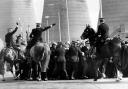 Miners strike 1984. Police horses move in on pickets as coal lorries enter Ravenscraig