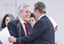Labour leader Sir Keir Starmer (right) and former Prime Minister Gordon Brown greeting each other
