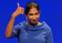 Home Secretary Suella Braverman gives a thumbs up after her speech at the Conservative Party annual conference
